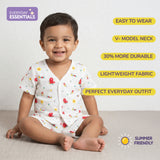 Child wearing a muslin cotton co ord set-  patterned outfit with product features listed on a white background